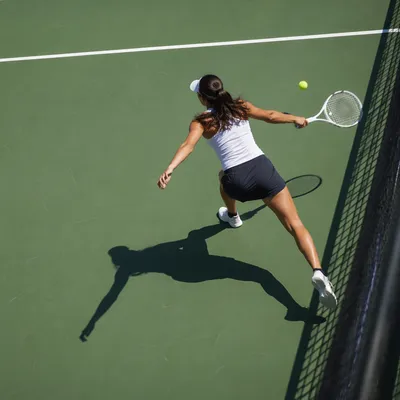 Overhead Tennis Return on Green Court