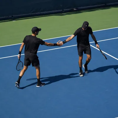 Tennis Players Low-Five on Outdoor Court