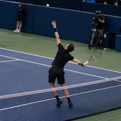 Indoor Tennis Serve on Blue Court