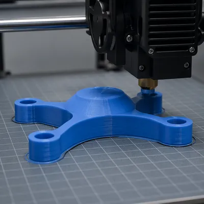 3D Printer Fabricating Blue Prototype