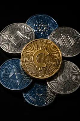 Golden Cryptocurrency Coins on Black Background