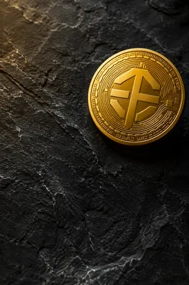 Golden Cryptocurrency Coin on Black Stone