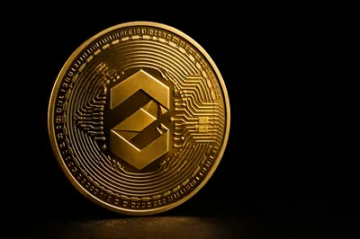 Golden Cryptocurrency Token on Matte Black