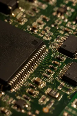Macro Green Circuit Board with Microchips