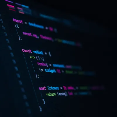 Dark Developer Screen With Glowing Code
