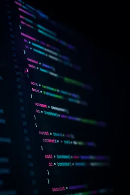 Late Night Coding Screen With Neon Syntax