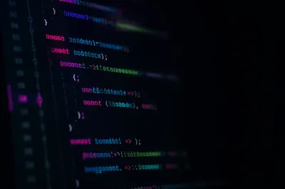 Late Night Coding Screen with Neon Syntax