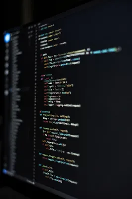Dark Programming Code on Developer Monitor