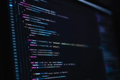 Dark Programming Code on Developer Monitor