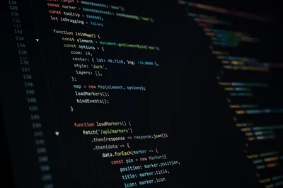 Dark Programming Code on Developer Monitor