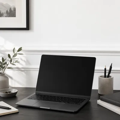 Minimal Modern Laptop Workspace on White Desk