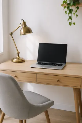 Modern Laptop Workspace with Brass Lamp