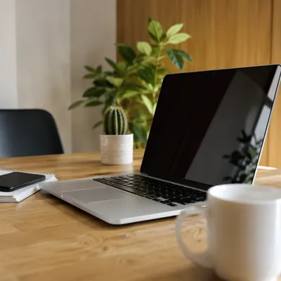 Modern Laptop Workspace with Warm Daylight