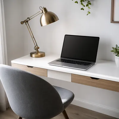 Modern Laptop Workspace with Brass Lamp