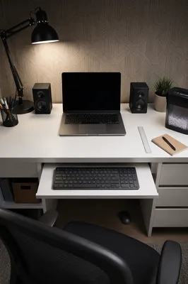 Modern Laptop Workspace on Clean White Desk