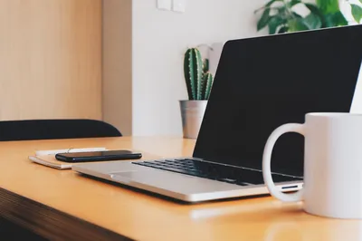 Modern Laptop Workspace on Honey Wood Desk