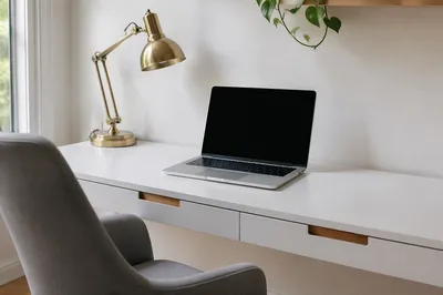 Modern Laptop Workspace with Brass Desk Lamp