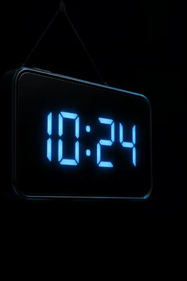 Glowing Blue Digital Clock Close Up