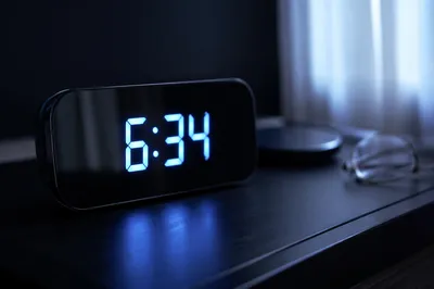 Glowing Blue Digital Clock at Dawn