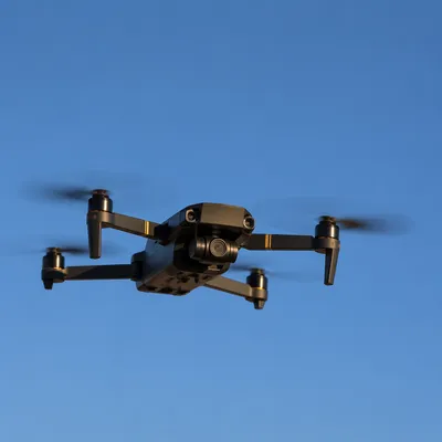 Photorealistic Drone Flying in Clear Blue Sky