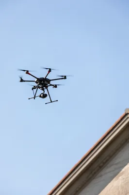 Professional Camera Drone in Clear Blue Sky