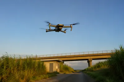 Quadcopter Drone Hovering Over Rural Service Road