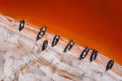 Drone Aerial View of Orange Shoreline Boats