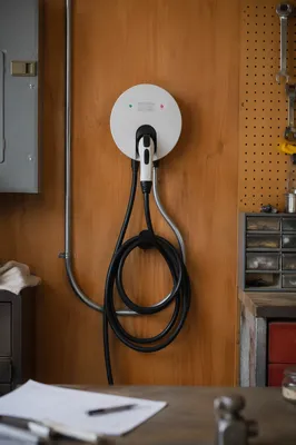 Wall-Mounted EV Charger in Garage Workshop