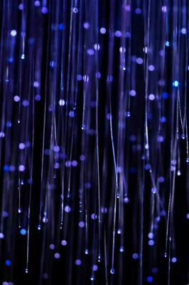Glowing Fiber Optic Cables in Blue