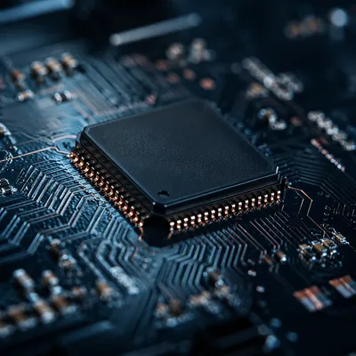 Macro Microchip Detail on Dark Circuit Board