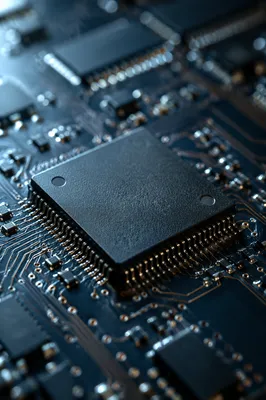 Macro Microchip on Dark Circuit Board