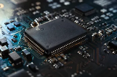 Macro Microchip on Dark Circuit Board