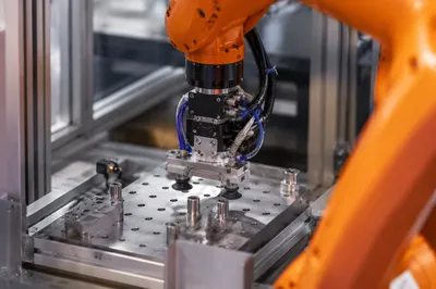 Orange Robot Arm in Factory Automation
