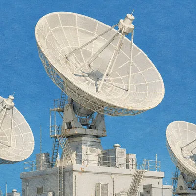Satellite Dish Array Under Blue Sky