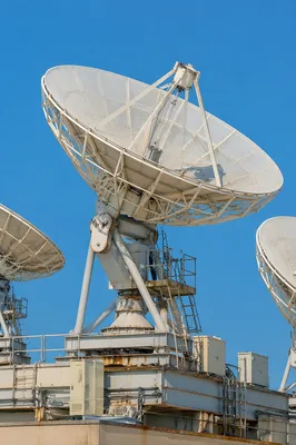 Satellite Dish Antenna Under Clear Blue Sky