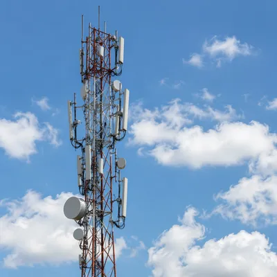 Communication Tower Under Bright Blue Sky