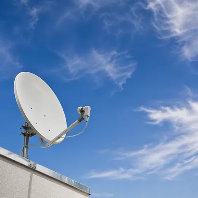 White Satellite Dish Under Clear Blue Sky