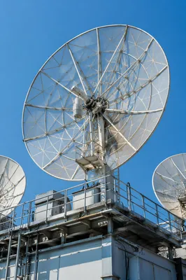 Satellite Dish Antenna Under Clear Blue Sky