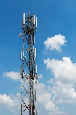 Communication Tower Under Bright Blue Sky