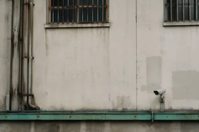 Industrial Exterior Security Camera on Concrete Wall
