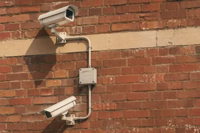 Outdoor Security Cameras on Brick Wall