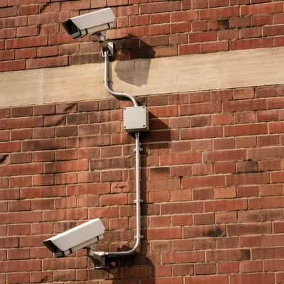 Outdoor Security Cameras on Brick Wall