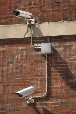 Outdoor Security Cameras on Brick Wall