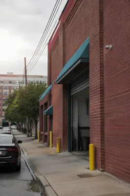Urban Security Camera on Brick Building