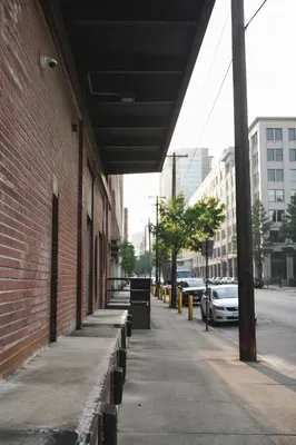 Security Camera on Brick Building Wall