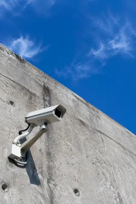 Outdoor Surveillance Camera on Concrete Wall