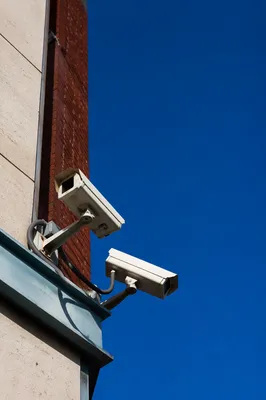 Security Cameras on Modern Building Wall