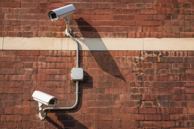 Outdoor Security Cameras on Brick Wall