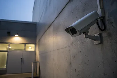 Security Camera on Concrete Building Wall