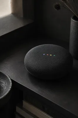 Smart Speaker on Dark Home Shelf